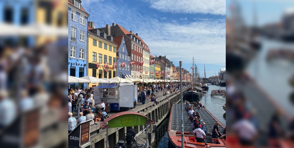 A street market alongside a canal in Aarhus, Denmark