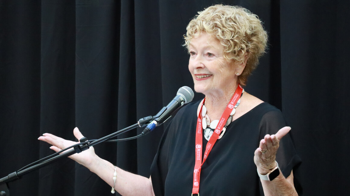 Woman speaking at podium