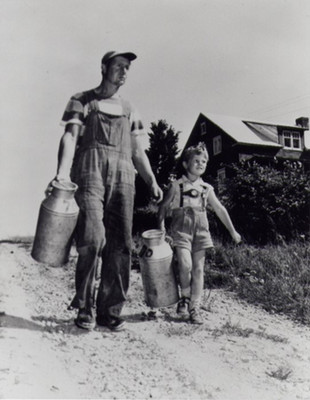 image of father and son walking toward us