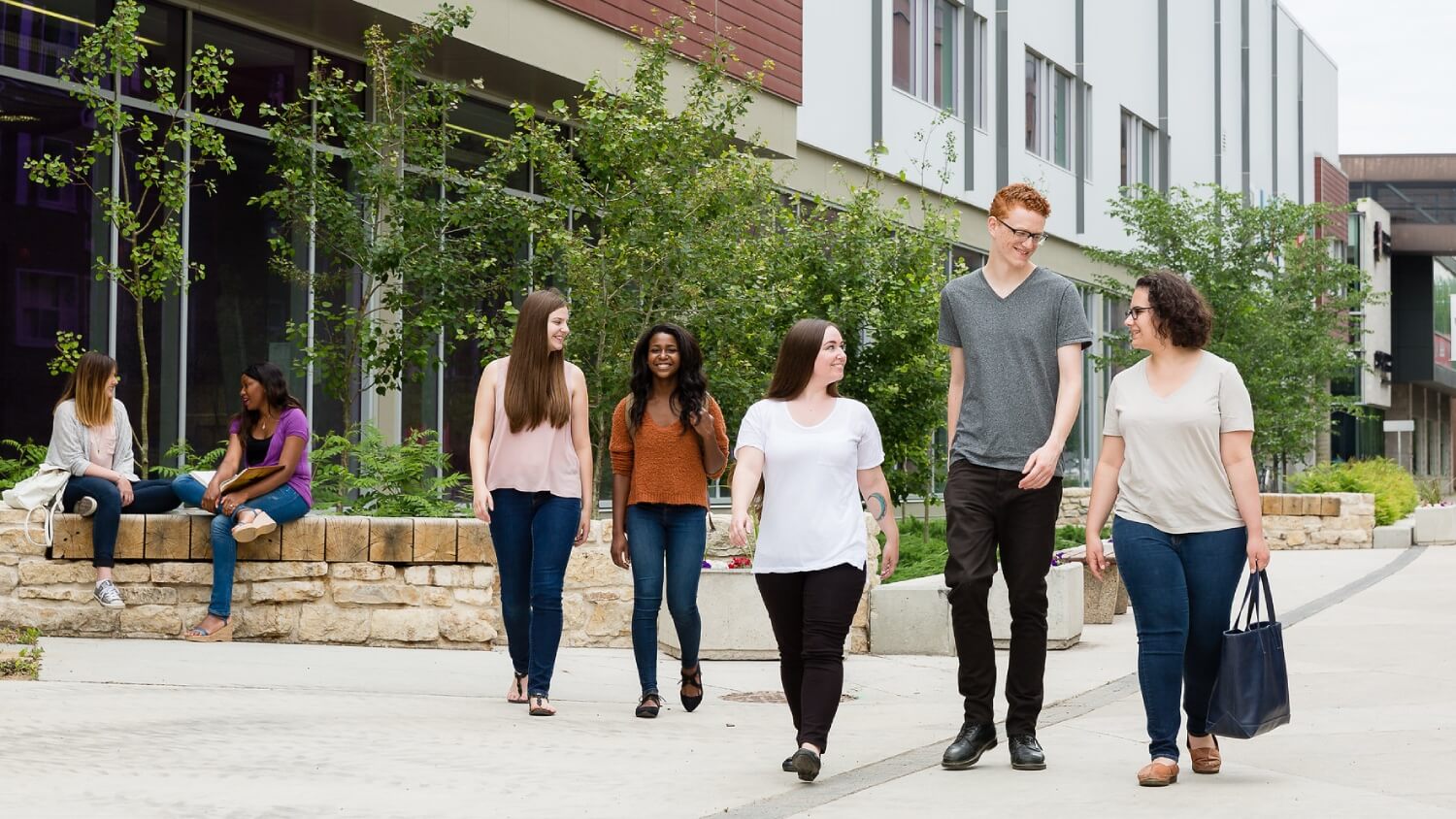 Students walk down Spence Street Corridor